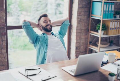 A man looking happy that he's updated his blogs